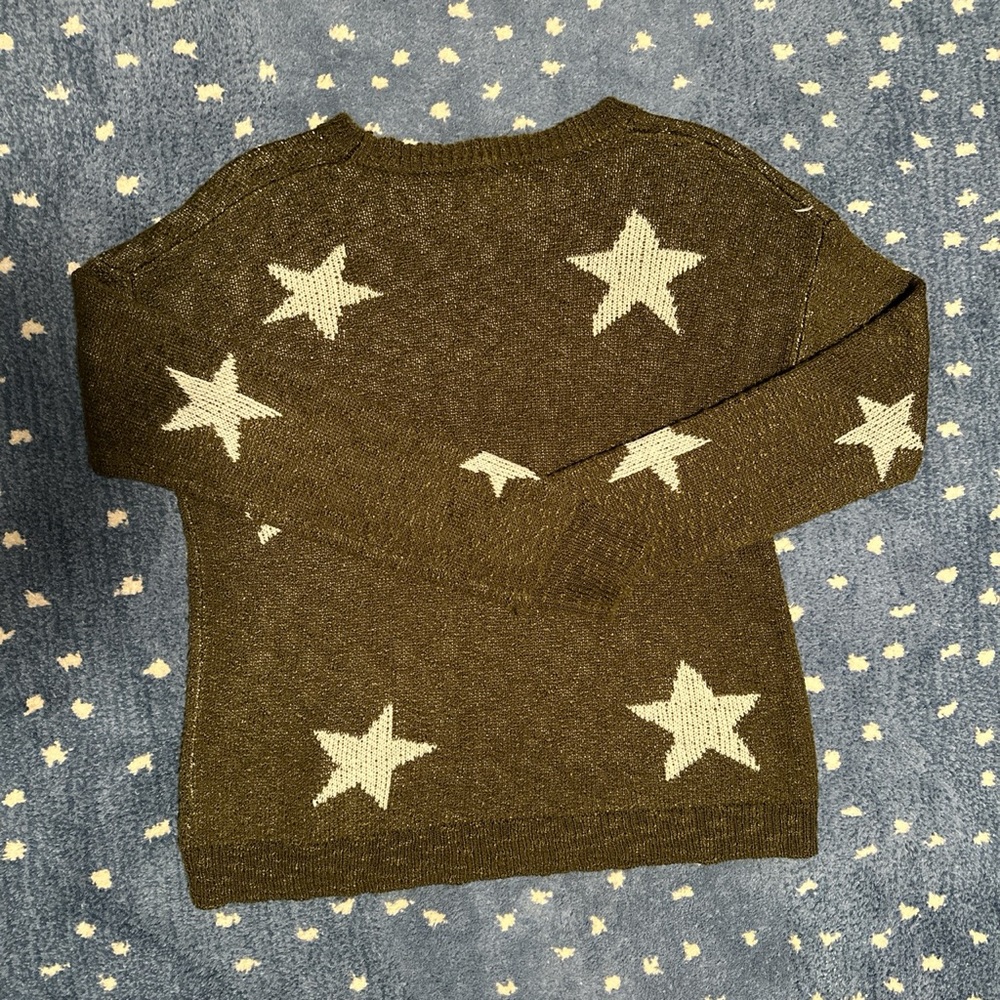 Dark green sweater with stars
